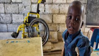 A student poses in the classroom. 38 year old Ronald Joseph lost both his legs in a motorcycle accident in 1997. On march 11, 2011 with the help of the non government organization Help for Haiti, Joseph transformed his personal loss into a communal gain by opening a school for handicapped children in the poor and often volatile Cite Soleil. Currently the one room school helps 50 children from the neighborhood but expansion plans are already underway.
Photo Logan Abassi UN/MINUSTAH