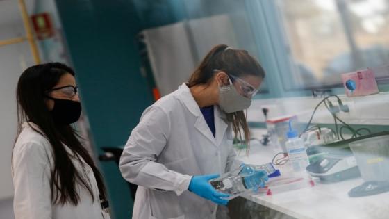 Laboratory technicians of biotechnology company mAbxience are seen as they work, amid the outbreak of the coronavirus disease (COVID-19), in Buenos Aires, Argentina August 13, 2020. REUTERS/Agustin Marcarian